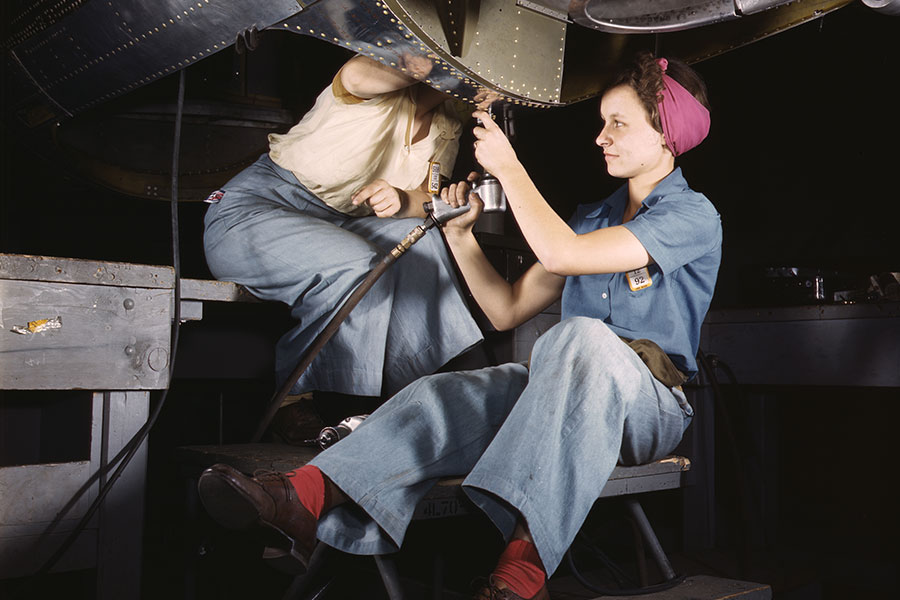 women working on plane